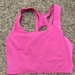 This item is a lululemon crop top sports bra with a pocket in the back